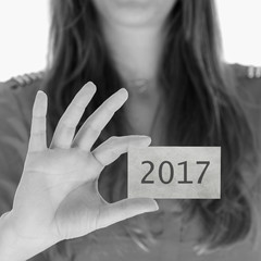 Canvas Print - Woman showing a business card - 2017