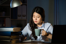 Asian Business Woman Drink Coffee Working Overtime Late Night