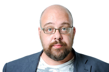 Portrait of a charming bearded man wearing glasses for vision.