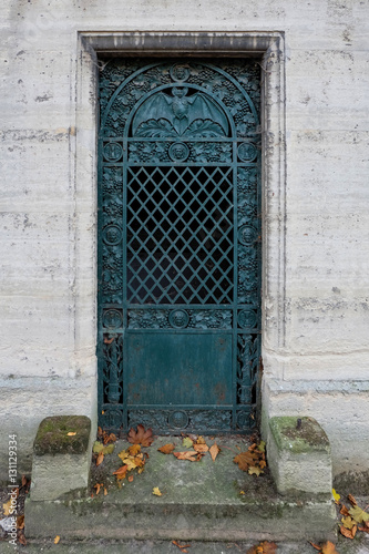 Bat Door Turquoise Closed Steel Entrance Gate Of An Old Tomb Bat Door Turquoise Closed Steel Entrance Gate Of An Old Tomb Crypt At A Graveyard Ornaments G Faces And In The Round Iron Arch Nocturnal