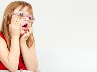 Wall Mural - Funny little girl in glasses