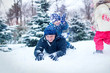 © 6okean - Attractive family having fun in a winter park