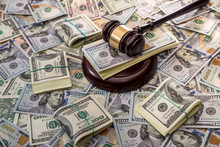 Wooden Law Gavel On Us Dollar Money Background