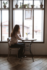 Poster - Pretty young lady sitting at cafe and waiting for boyfriend