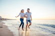 © kurapatka - loving couple on the beach