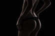 © Aleksandr Doodko - sexy woman in black lingerie over black background