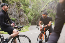 Three Road Cyclists Taking A Break In Cheddar Gorge, U.K