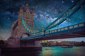 Wall Mural - tower bridge with milky way galaxy at night sky in london, uk