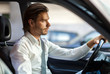 © Minerva Studio - Portrait of a man driving his car