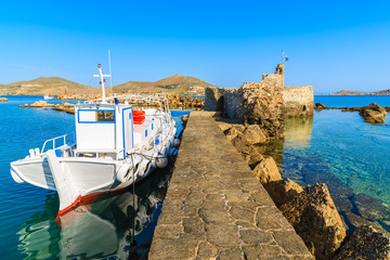 Wall Mural - Fishing boat anchoring in Naoussa port on Paros island, Greece