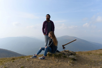 Wall Mural - Couple on mountain top