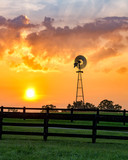 Windmill and scenic summer sunrise