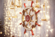 Sea Wheel On Wall With Christmas Lights