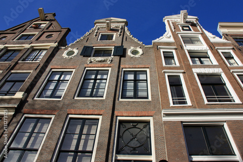 Plakat Gabled domy w dokach Amsterdamu, Holandia