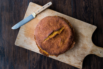 Turkish Cornbread / Misir Ekmegi on wooden surface.