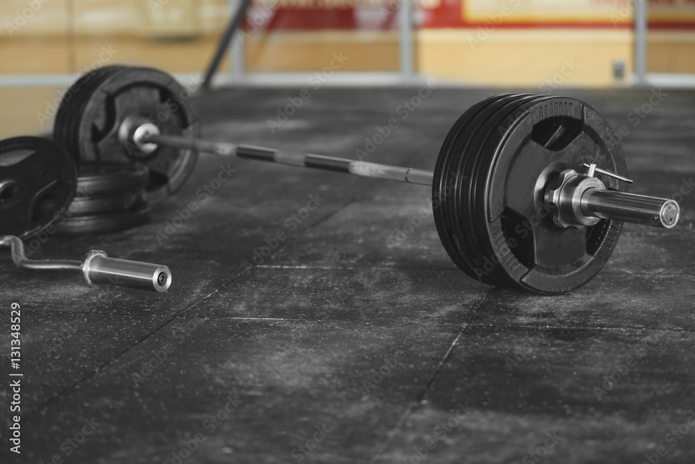 Barbell on floor in gym