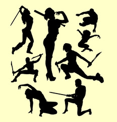 Wall Mural - Using weapon martial art silhouette. Good use for symbol, logo, web icon, mascot, sign, sticker, or any design you want