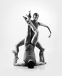 © Acronym - Young ballet dancers on a white background