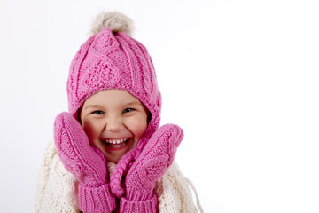 girl in a knitted hat and  mittens