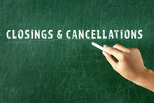 Text CLOSINGS And CANCELLATIONS, Female Hand With Piece Of Chalk On Blackboard Background