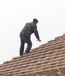 © schankz - workers working on the roof