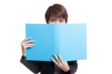 Wall Mural - Young Asian working woman with folder.