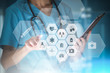 © PhotoPlus+ - young woman nurse or doctor is using innovative technologies in order to manage her work in the hospital