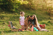 © jul14ka - mother and daughter at a picnic with a dog