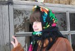 © st_fox - a woman in a colorful headscarf