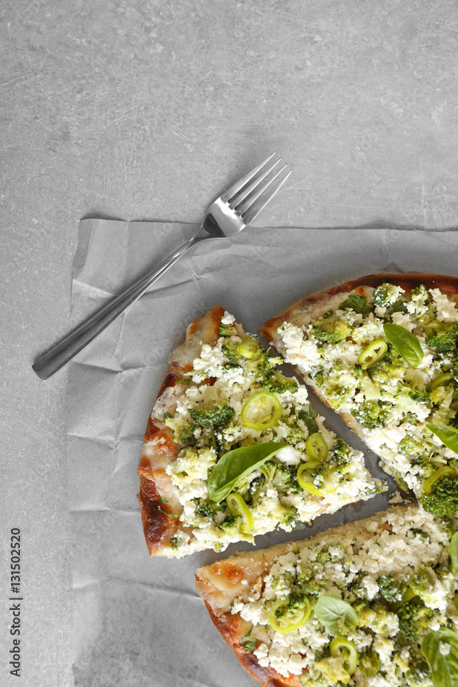 Vegetarian Italian pizza with cheese and vegetables on color background