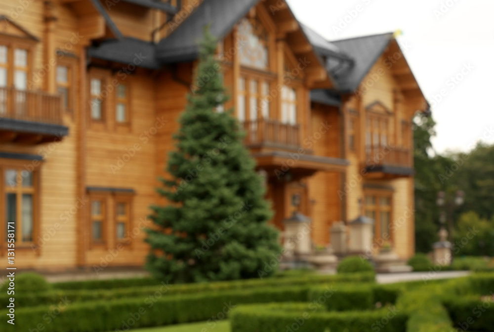 Blurred facade of vintage wooden building