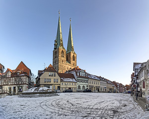 st. nicolai church and old half timbered houses in quedlinburg