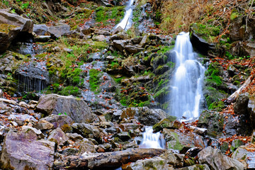 Canvas Print - Beautiful waterfall and big stones in mountains