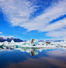 Canvas Print - The clouds and  icebergs