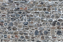 Fortress Wall With Snow On Gray Stones