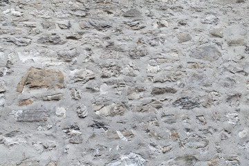 Old fort wall made of gray stones