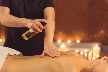 Poster - Skillful masseuse serving client at spa