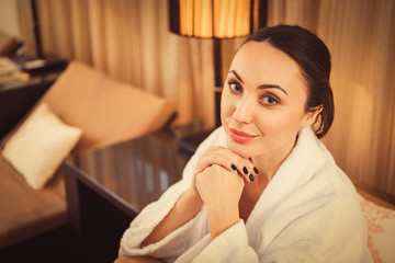 Sticker - Confident young woman having rest at spa