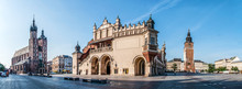 Panorama Of Main Market Square (Rynek) In Cracow, Poland With The Renaissance Drapers' Hall (Sukiennice), Gothic St Mary Church, Medieval City Hall Tower. The Biggest Medieval Market Square In Europe