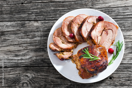 Fotografie, Obraz slices of delicious barbecue turkey roulade with cranberry