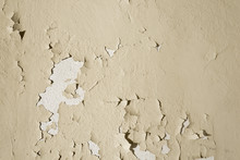 Natural Background. Wall With A Shabby And Peeling Paint And Plaster. Contrast And Volume, White, Beige.
