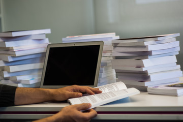 Guy or man or student or businessman work on a laptop computer i