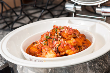 Wall Mural - baked fish with tomato, onion