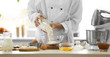 © Africa Studio - Cooking concept. Professional confectioner making delicious dessert, closeup