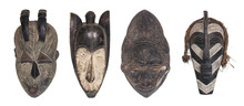 Four Traditional Wooden African Totem Masks From Nigeria Isolated On White Backround