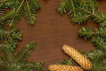 Christmas green pine  spruce branch on wooden background