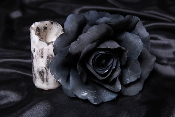 black rose and a white old candle black white magic