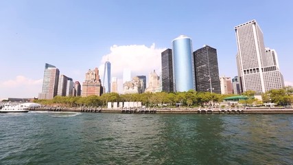 Wall Mural - New York cityscape, view of skyscrapers in lower Manhattan, also known as downtown, from Hudson river. Very famous skyline that attracts a lot of tourists.