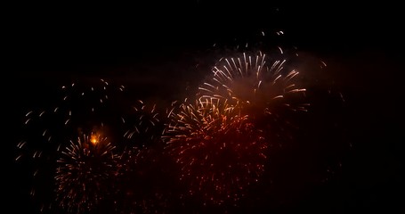 4K fireworks footage exploding in a black sky in Geneva Switzerland