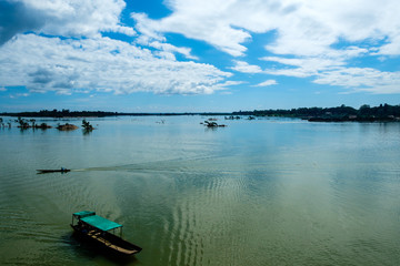 Naklejka na meble Boat at the Cambodia-Laos border on the Mekong river